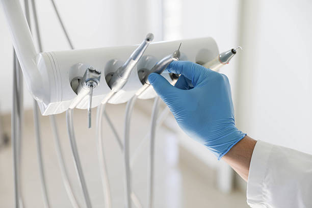 Professional Emergency Dentist technician working in West Falmouth, MA